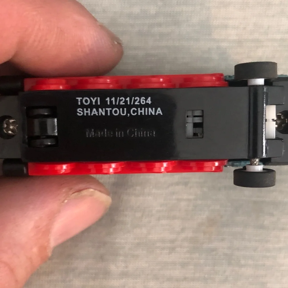 Blue and Red Toy Train with Gold Accents